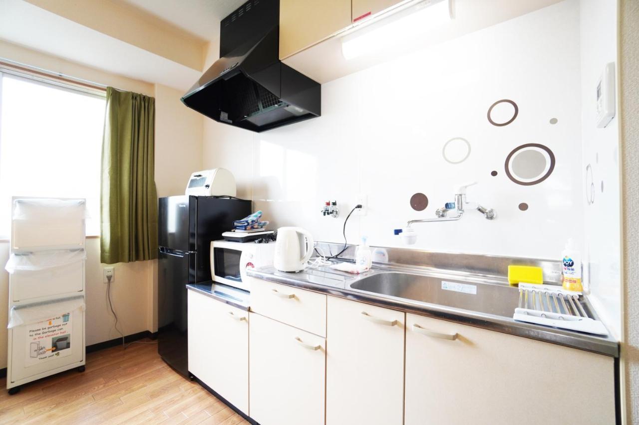 Apartamento Akimi Building Osaka Exterior foto